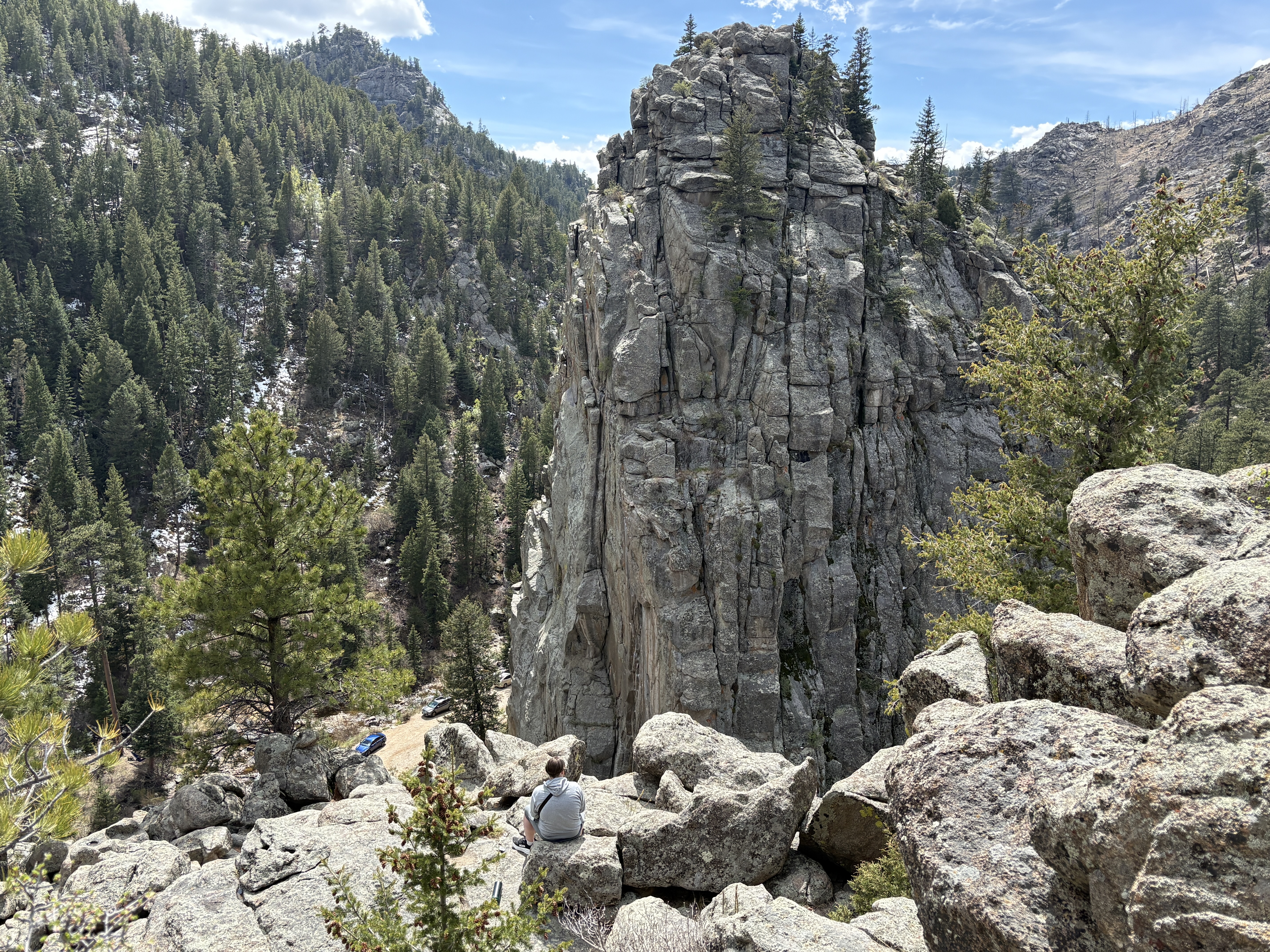 Granite tower surrounded by forest in Boulder Canyon